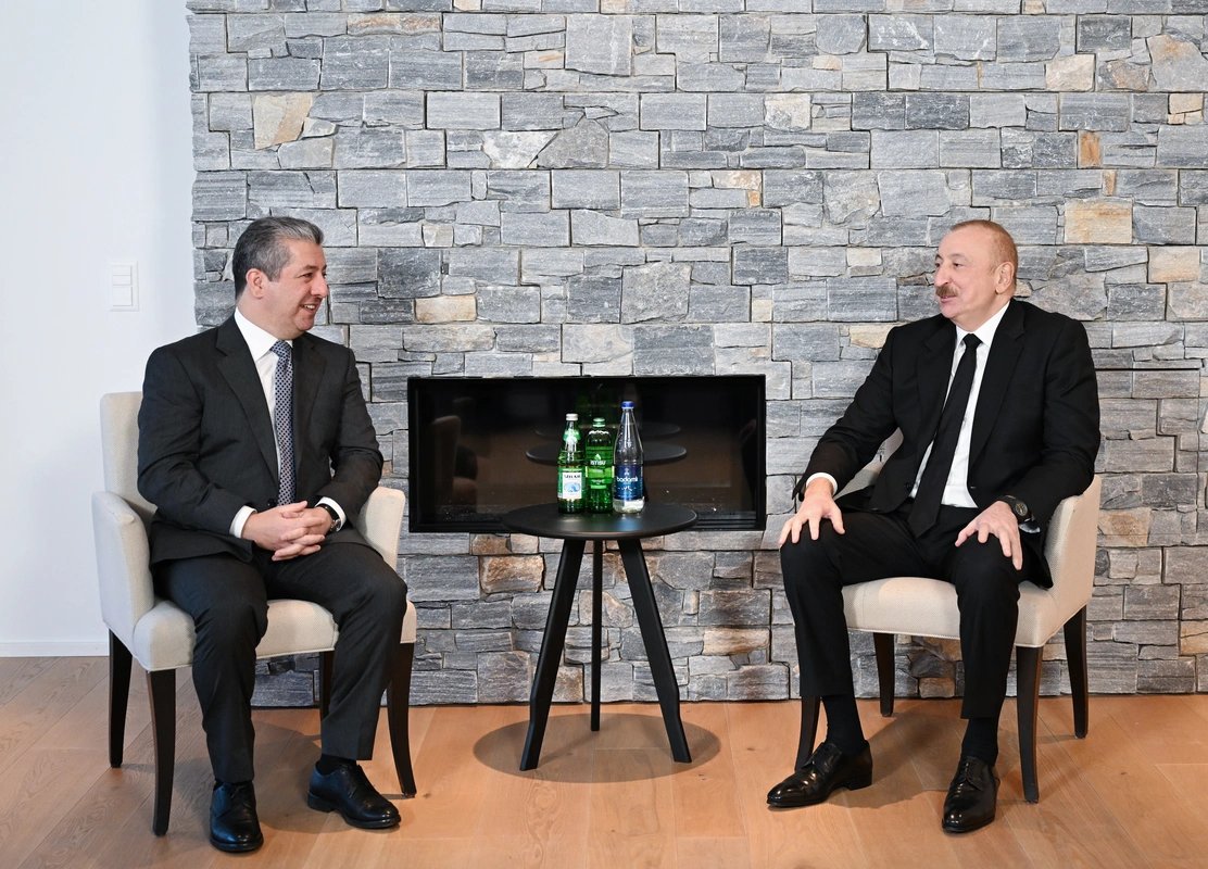 İlham Əliyev Davosda İraq Kürdüstan Regionunun baş naziri ilə görüşüb