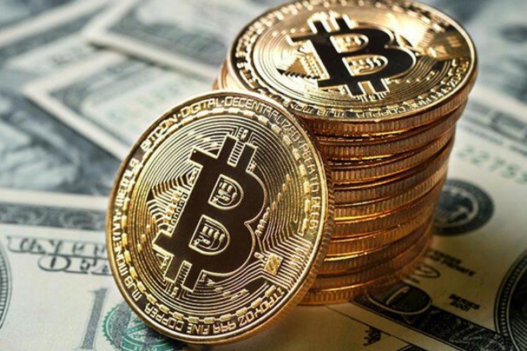 Bitcoin 70 min dollara yaxınlaşır